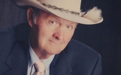 K. Norman “Buck” Holmes